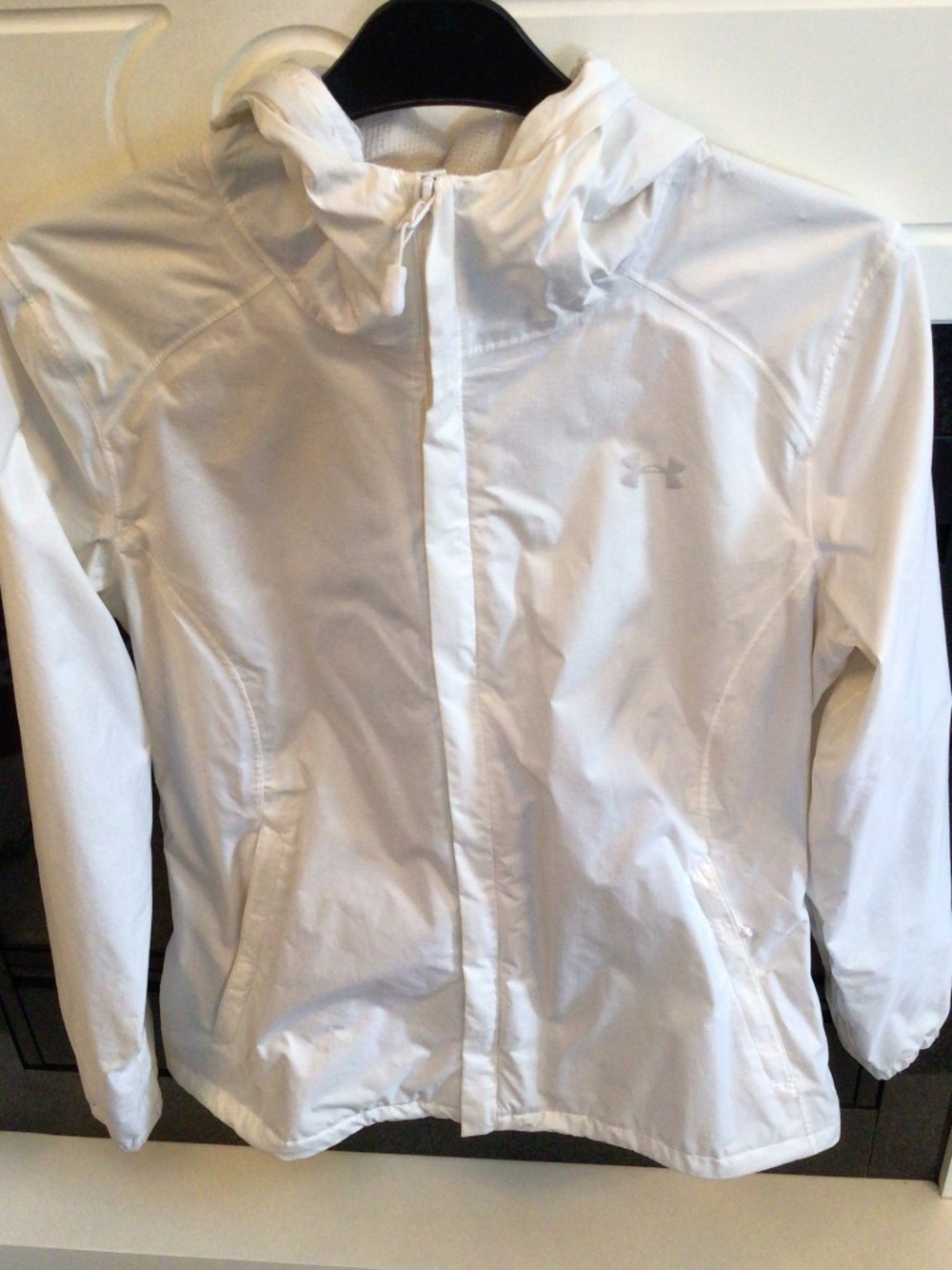 Women’s under armor white xs windbreaker jacket and a pink under armour hat